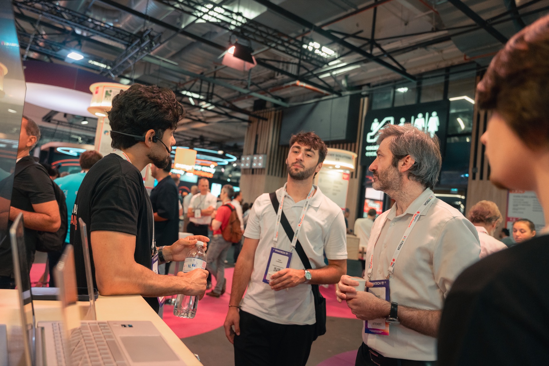 Glot team member talking with visitors at the VivaTech 2026 booth