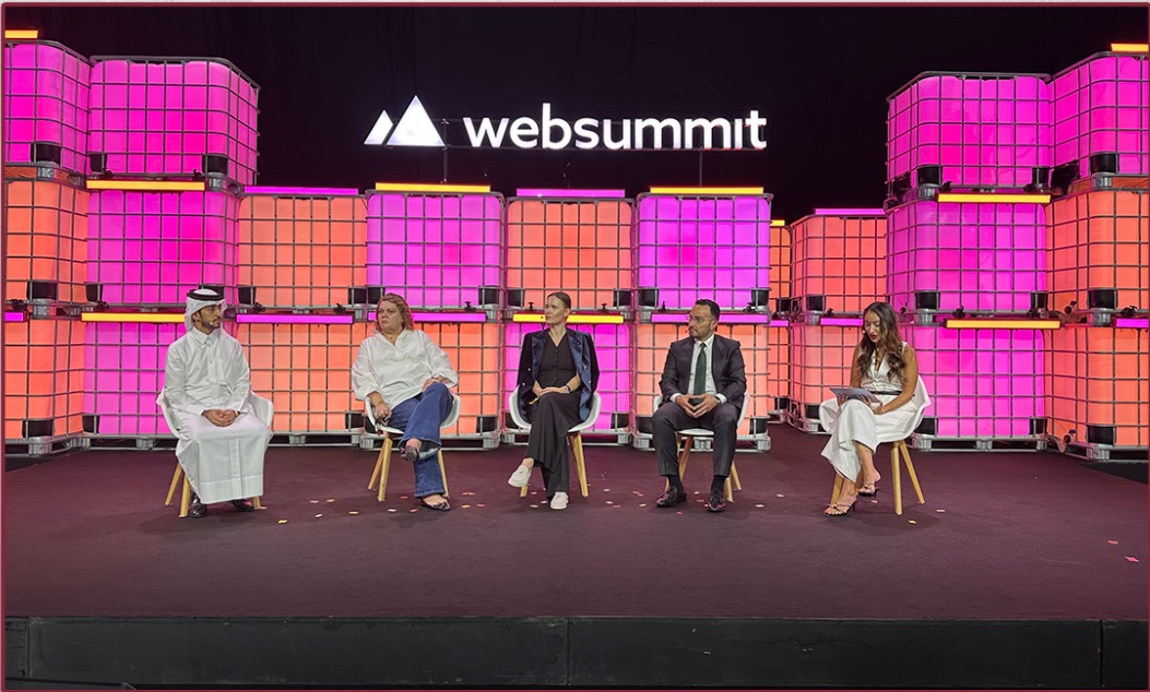 Panel discussion on stage at Web Summit Qatar